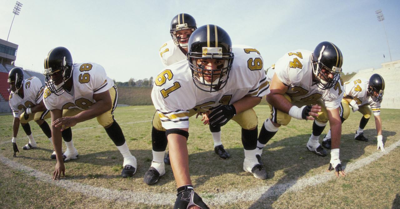 Why Do Football Players Wear Towels? Here's the Scoop