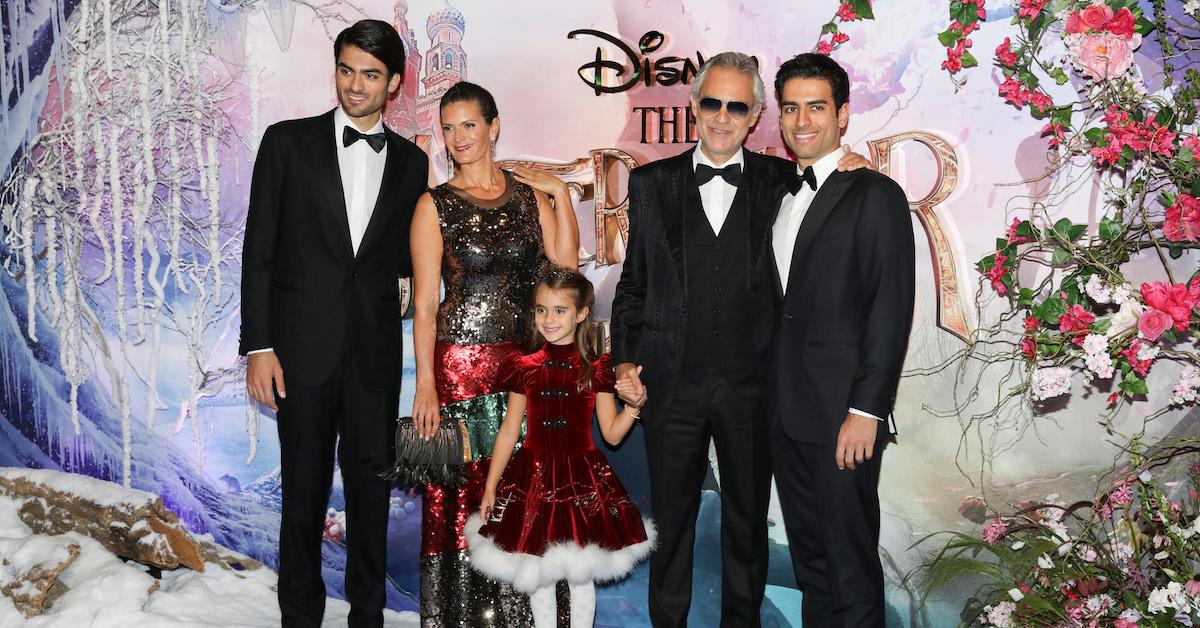 Andrea Bocelli at the piano with his wife Enrica Cenzatti and their son Amos.  The Italian tenor Andrea Bocelli seated at the …