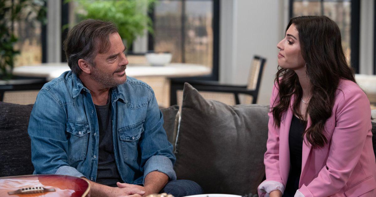 Wally Kurth and Amanda Setton sitting on a couch on 'General Hospital'