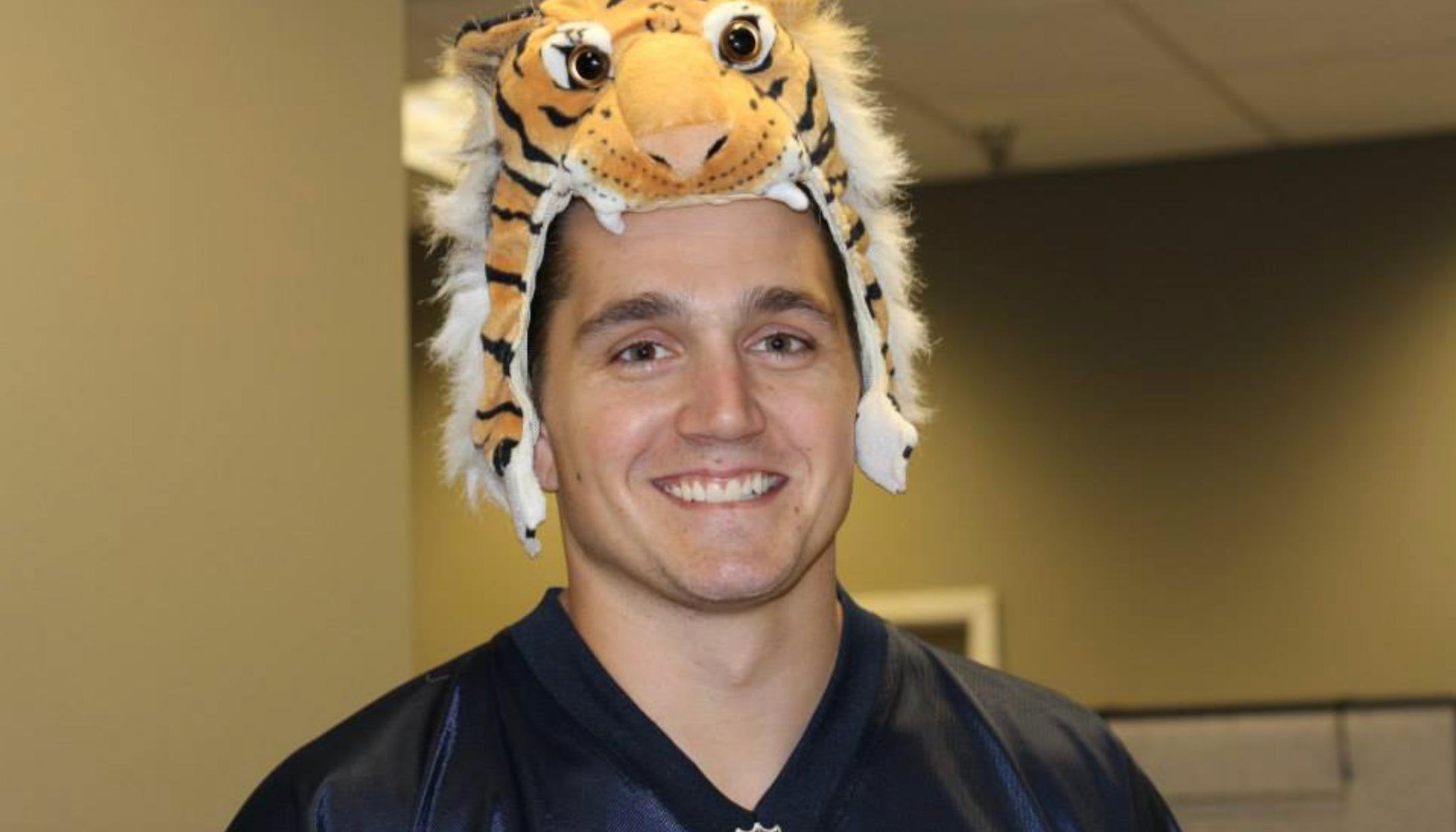 Timothy Bliefnick wearing a tiger hat on his head