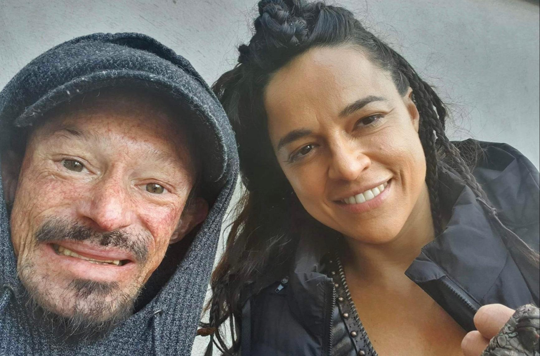 Darren Kent smiling with Michelle Rodriguez