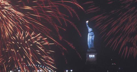 Statue of Liberty with fireworks.