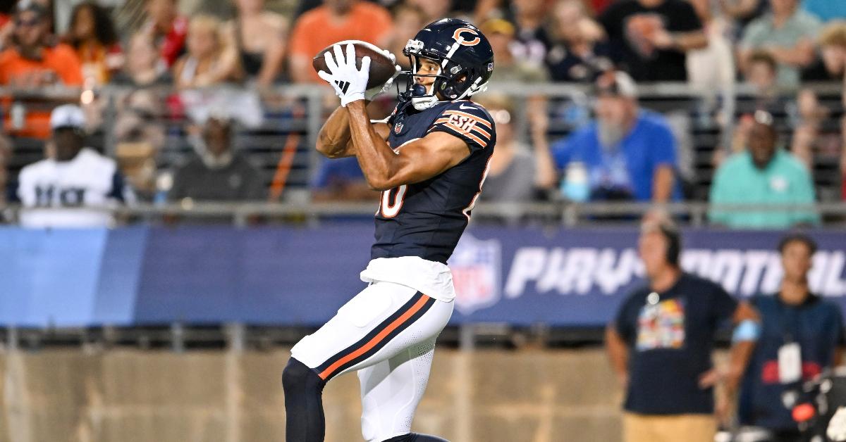 collin johnson  of the chicago bears catches a  yard touchdown pass