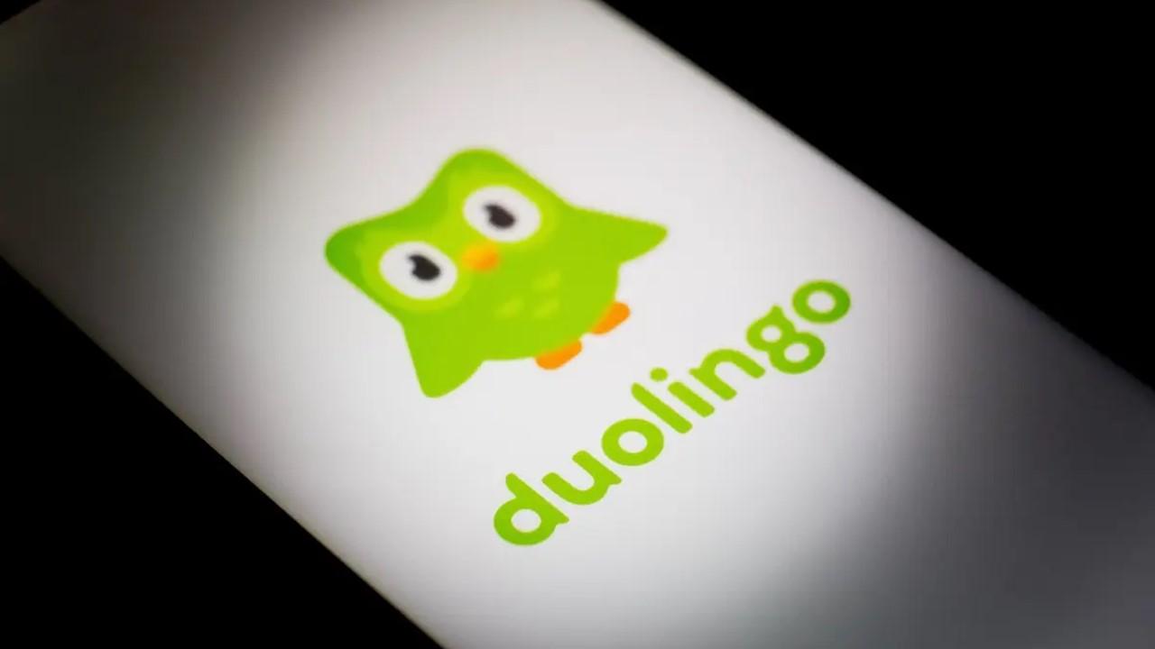 The Duolingo logo on a smartphone