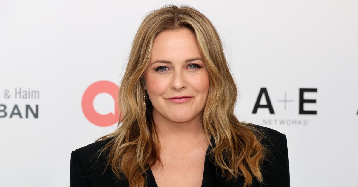 Alicia Silverstone poses on the red carpet at the Elton John AIDS Foundation's 32nd Annual Academy Awards Viewing Party on March 10, 2024.