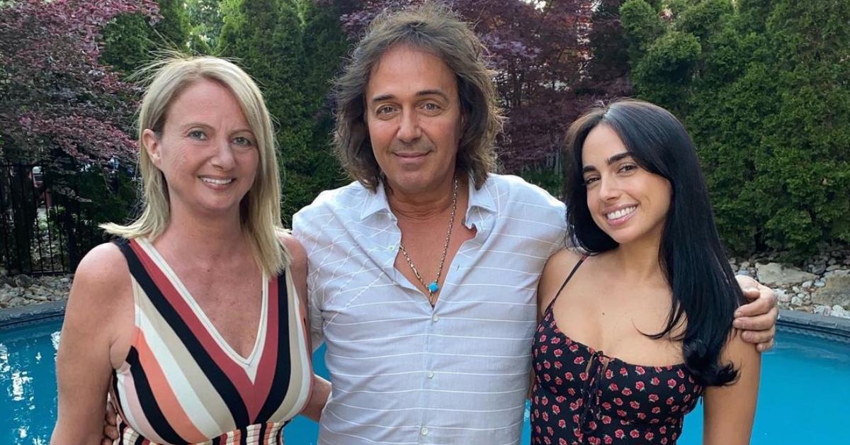 Maria Georgas with her family in front of a pool