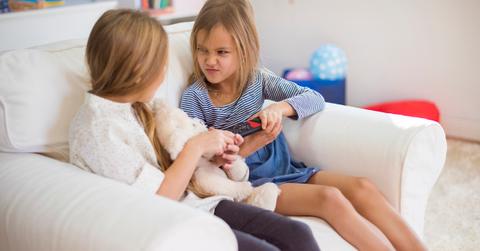 sisters fighting over remote