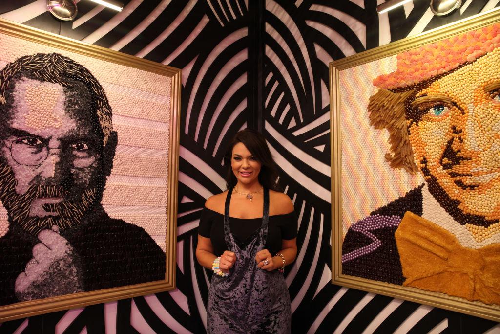 Jackie Sorkin with candy portaits of Steve Jobs and Willy Wonka