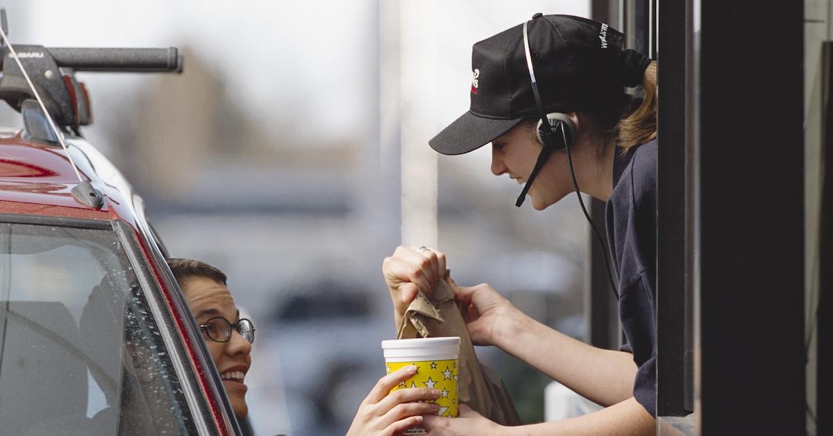 A woman at a drive-through