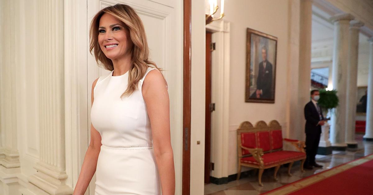 Melania Trump in a white dress at the White House. 