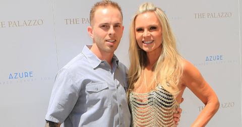 Ryan Veith poses for a photo with his mother Tamra Judge at an event