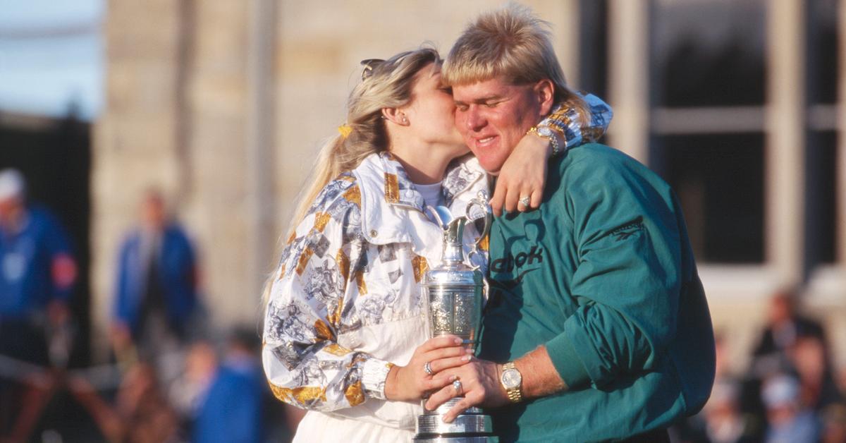 John Daly gets a kiss from his wife Paulette following his victory during The 124th Open Championship on the Old Course at St Andrews, from July 20-23,1995 in St Andrews, Scotland