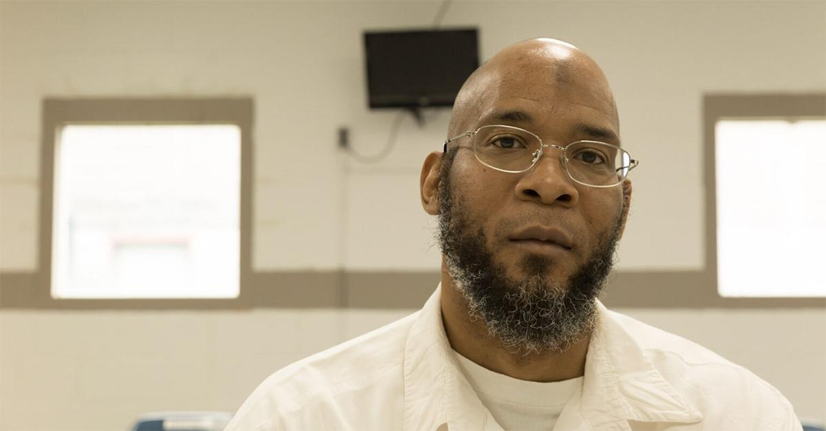 Marcellus Williams sitting in prison with glasses on. 