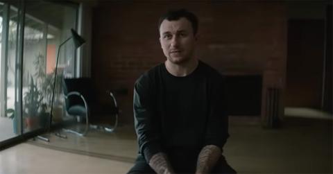 Johnny Manziel giving an interview in a house.