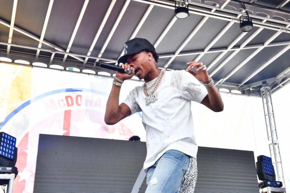 Rapper Lil Baby performs onstage during the McDonald's All American Games Fan Fest 