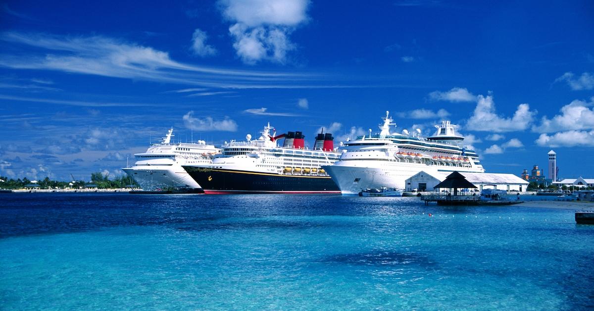 A trio of cruise shopes at a Caribbean dock