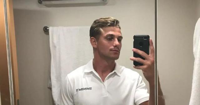 Adam Lukasiewicz taking a mirror selfie.
