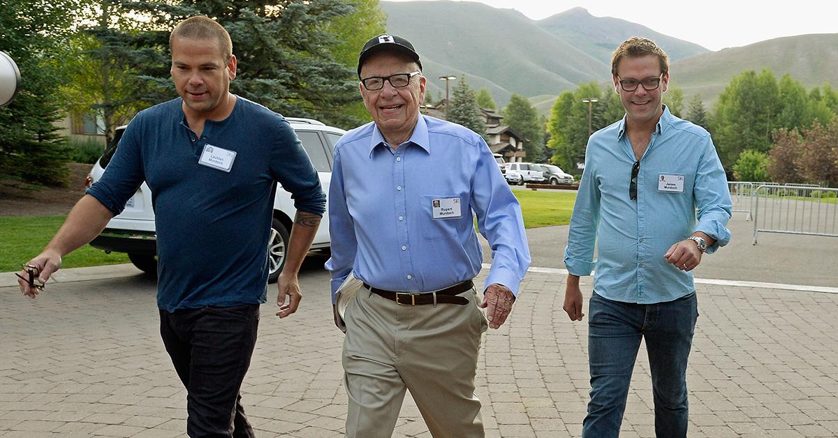 James, Rupert and Lachlan Murdoch walking in casual clothing.