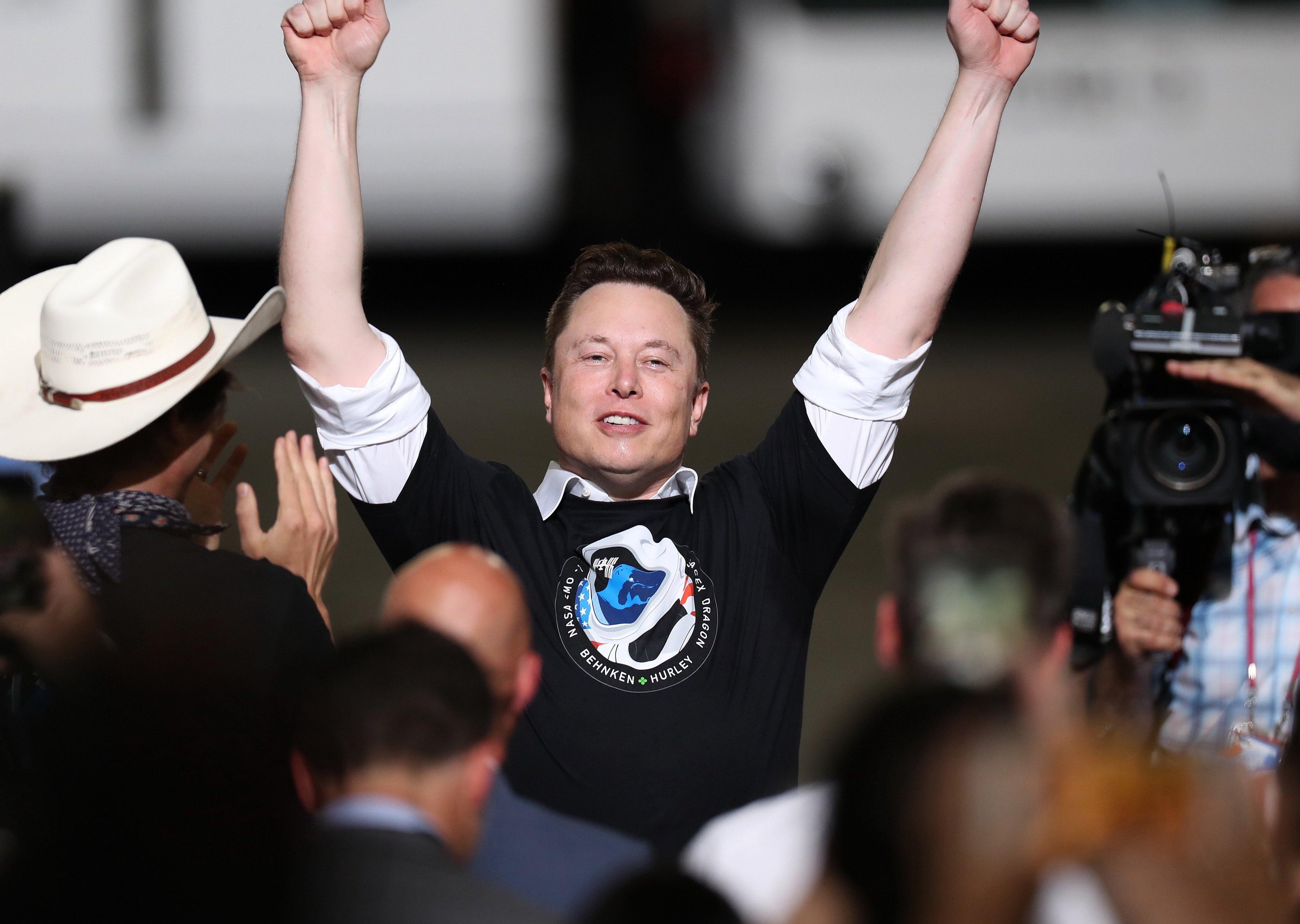  Elon Musk celebrates the successful launch of the SpaceX Falcon 9 rocket.