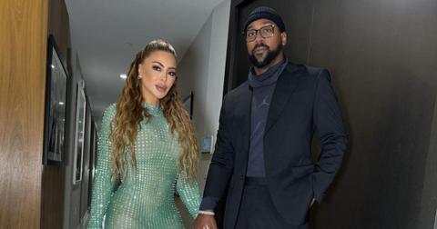 Larsa Pippen and Marcus Jordan holding hands