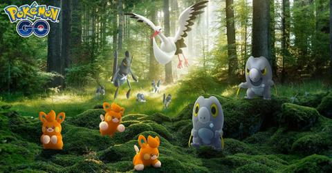Pawmi and other Pokémon in a forest.