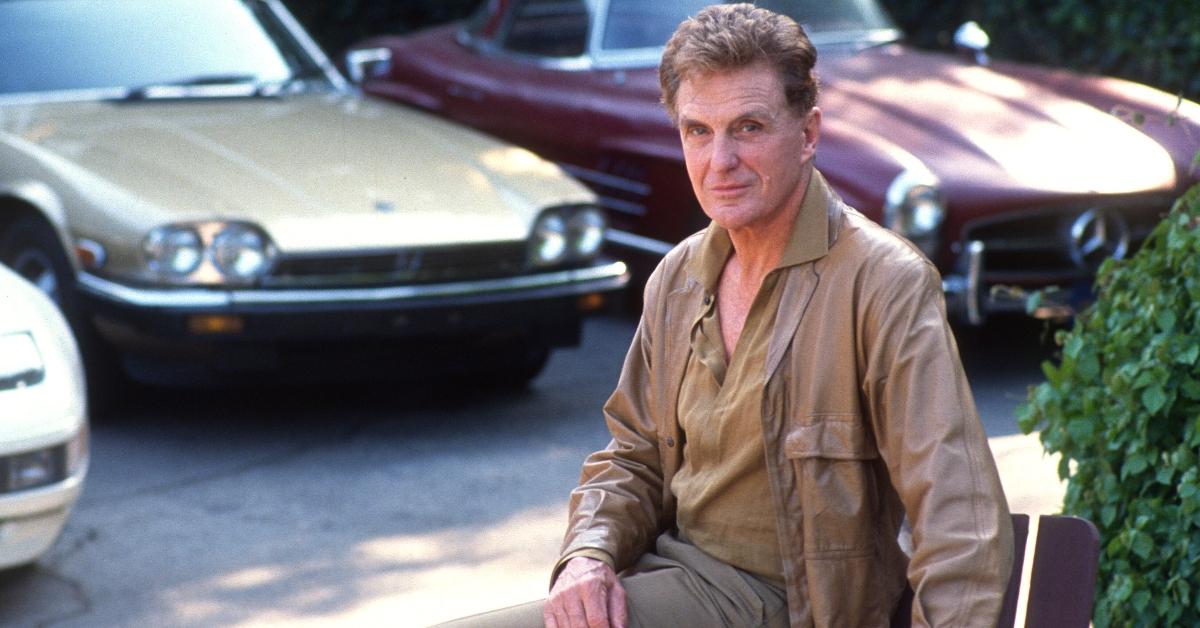 Robert Stack with his collection of cars at home, Dec. 23, 1989