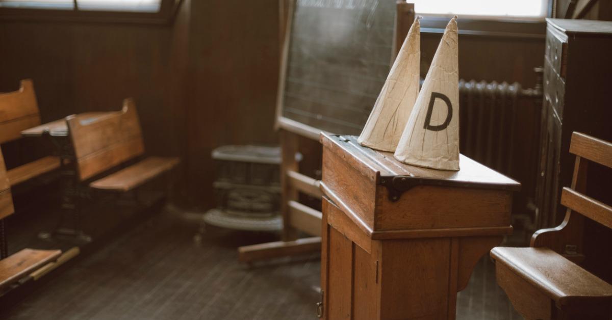 dunce caps in an old school classroom picture id