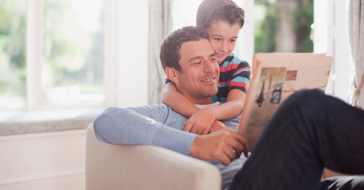 dad reading with son