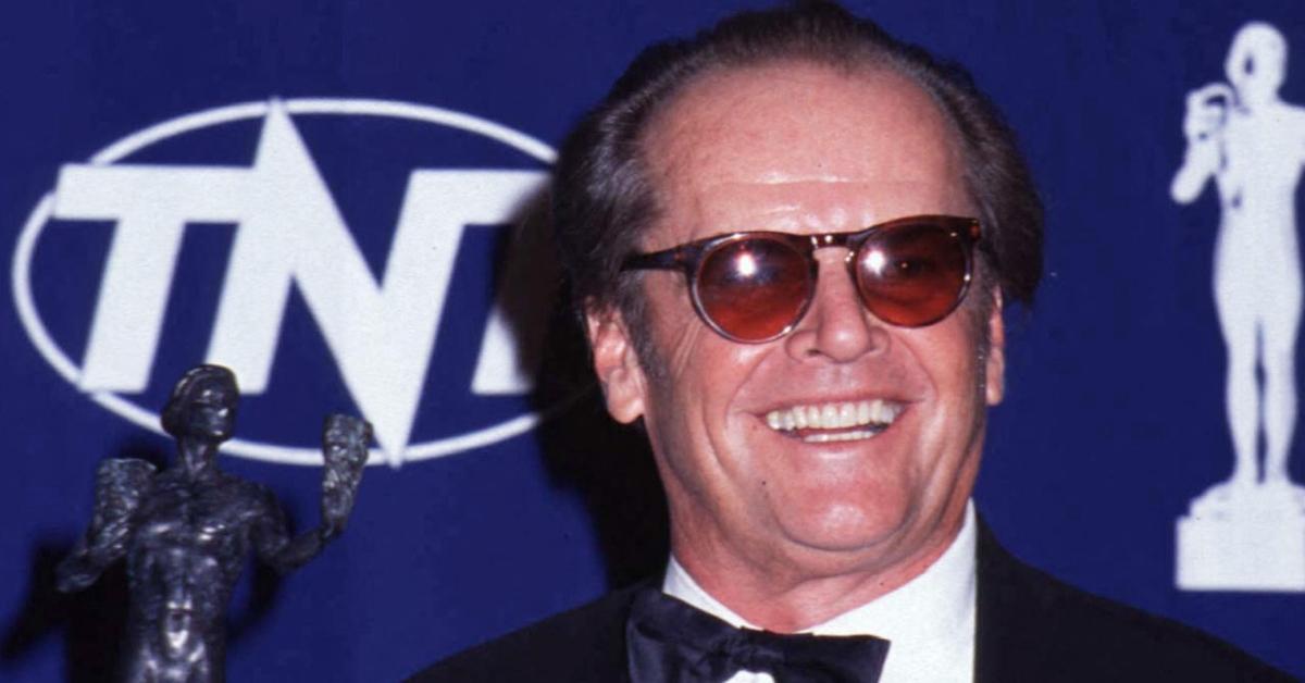 Jack Nicholson holding an award.