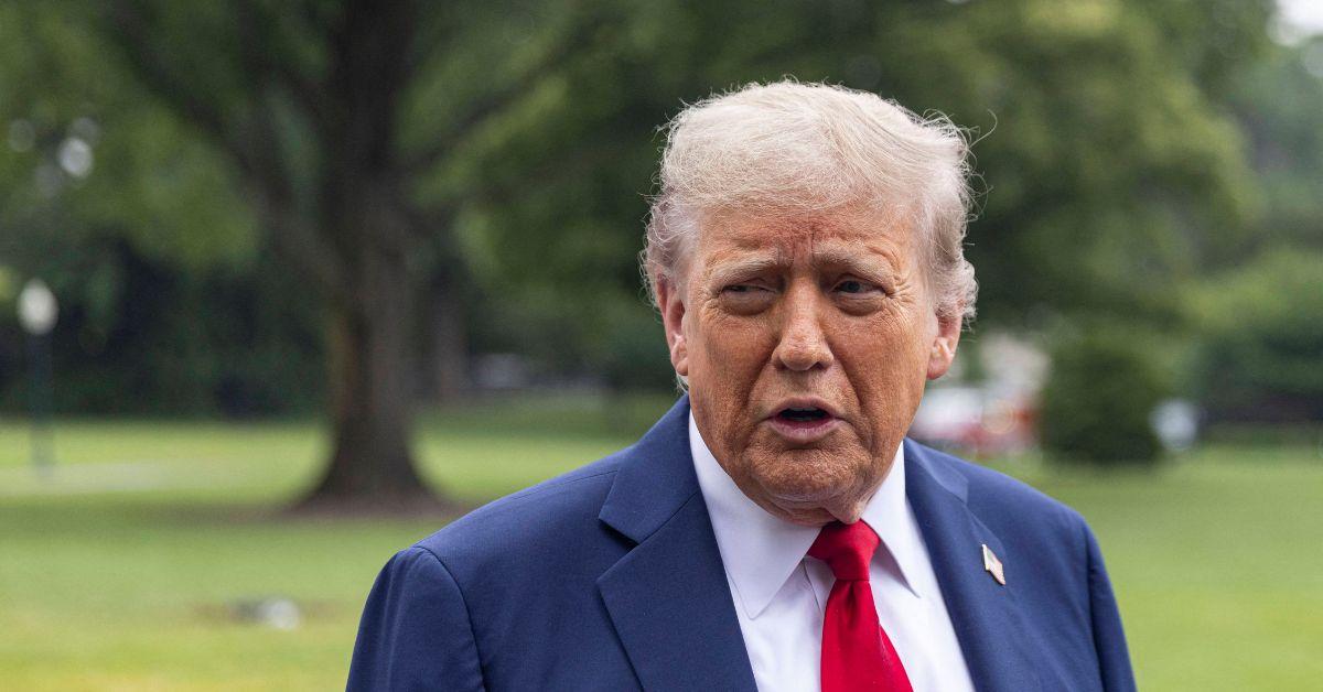 Trump talking to reporters outside the White House. 