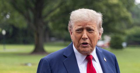 Trump talking to reporters outside the White House.