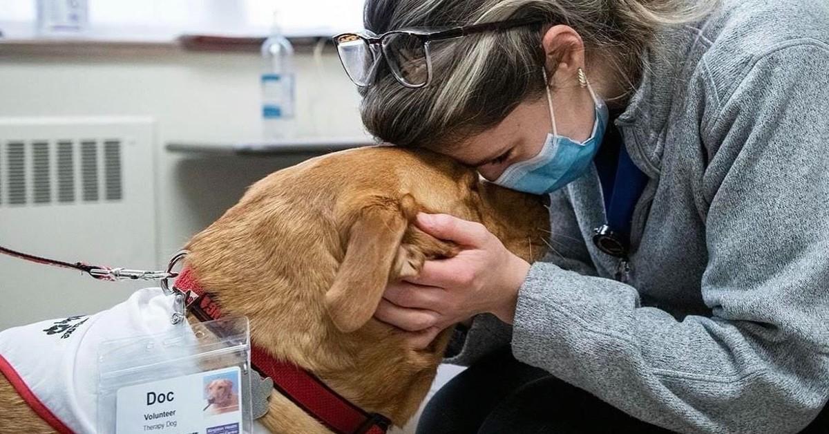 Kaity Biggar and Doc the therapy dog 