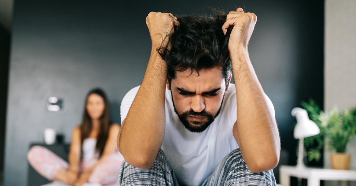 Husband and wife fight over mom's birthday reminder - Stock Image