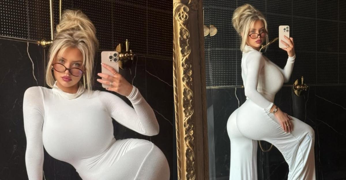 Mikayla Demaiter poses in front of a mirror