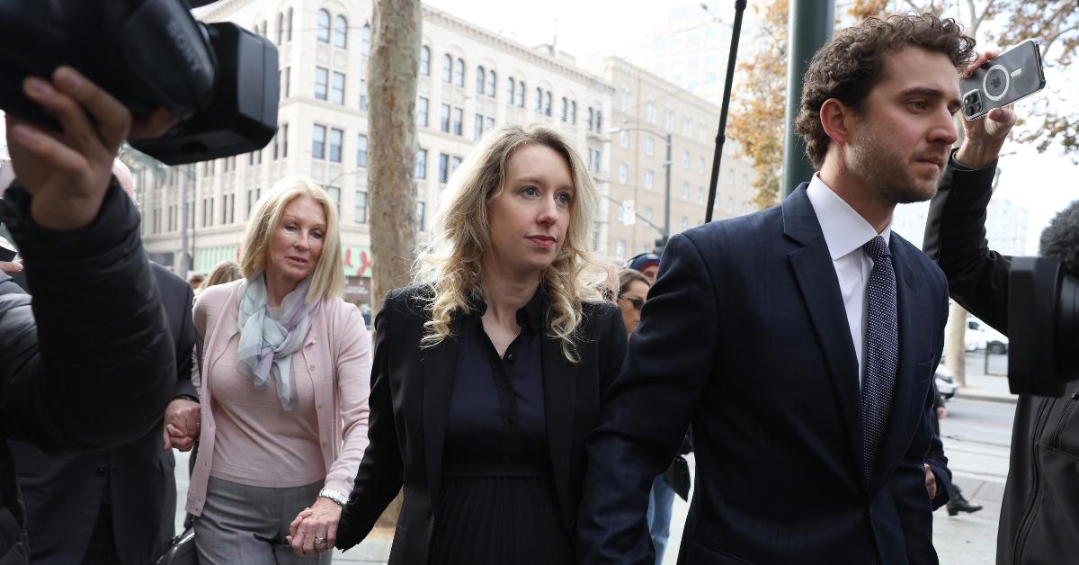 Elizabeth Holmes with partner Billy Evans and mom Noel Holmes