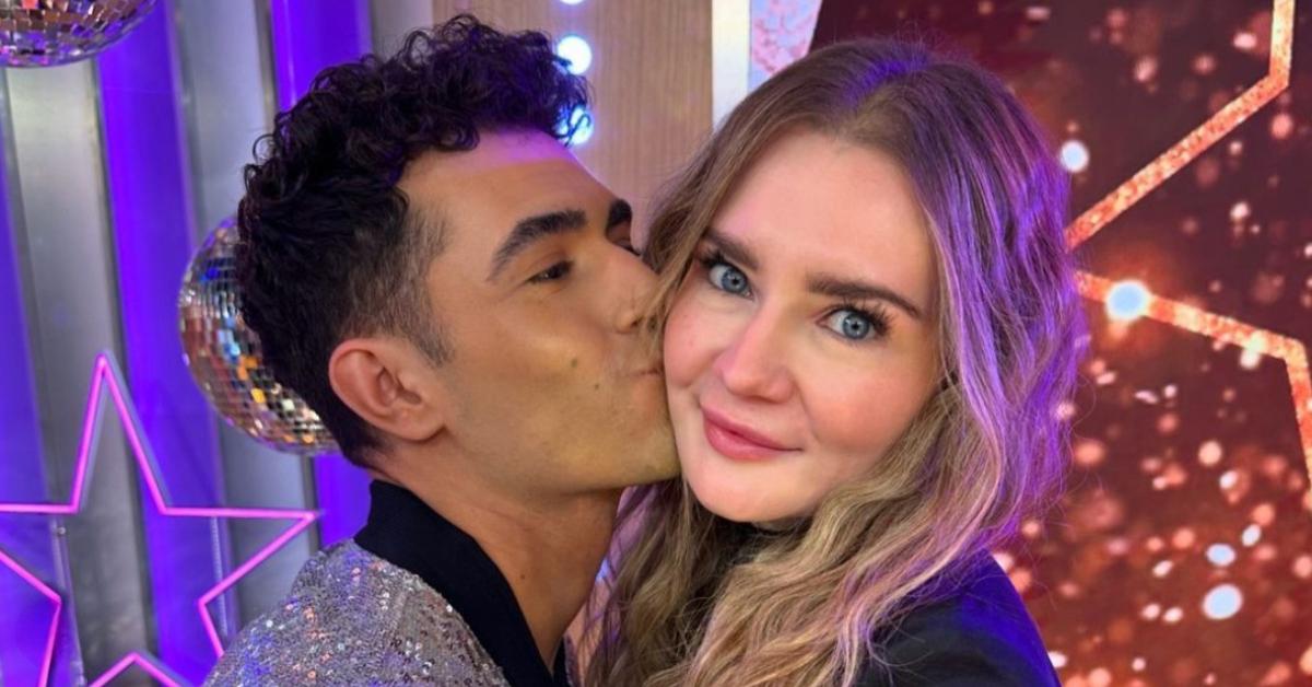 Anna Delvey and Ezra Sosa smiling for 'DWTS' Season 33 announcement.