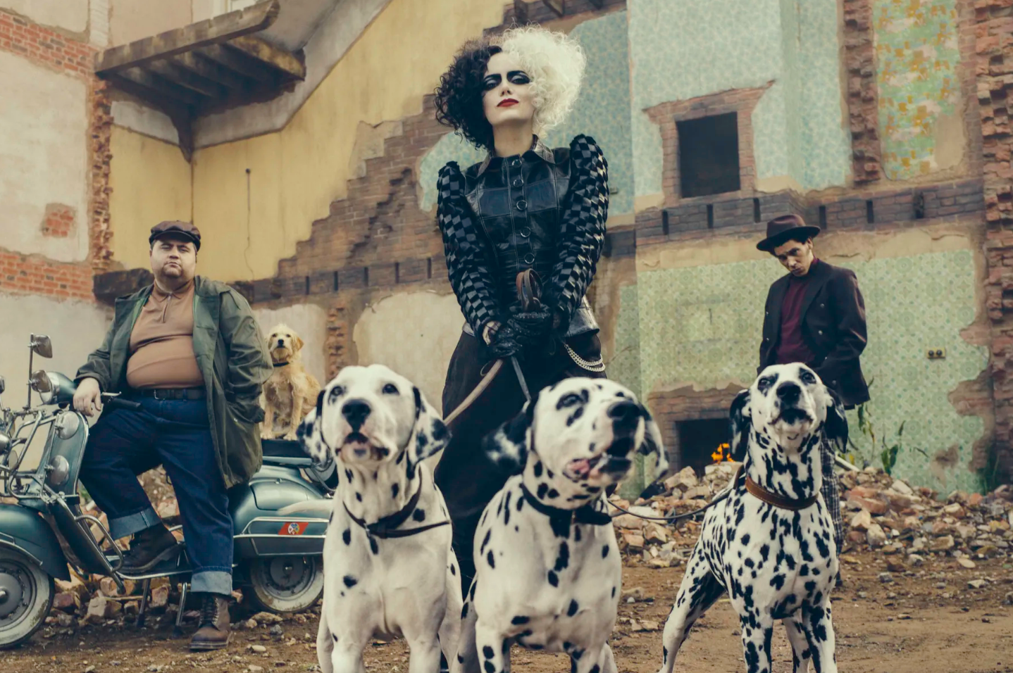 Cruella De Vil with three Dalmations. 