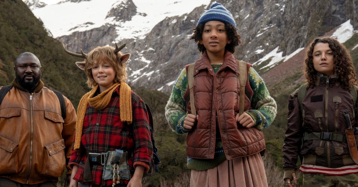 'Sweet Tooth' Season 3 main cast standing in front of mountains.