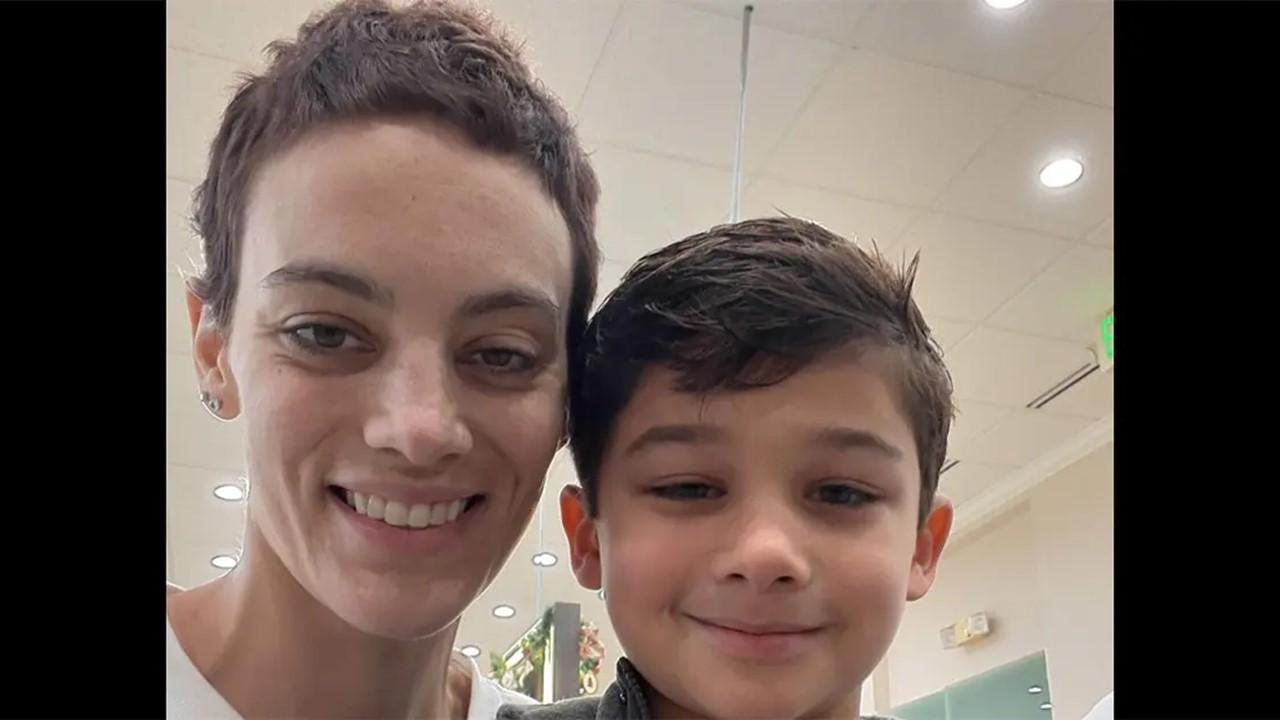 Cat Janice with her son Loren in the hospital