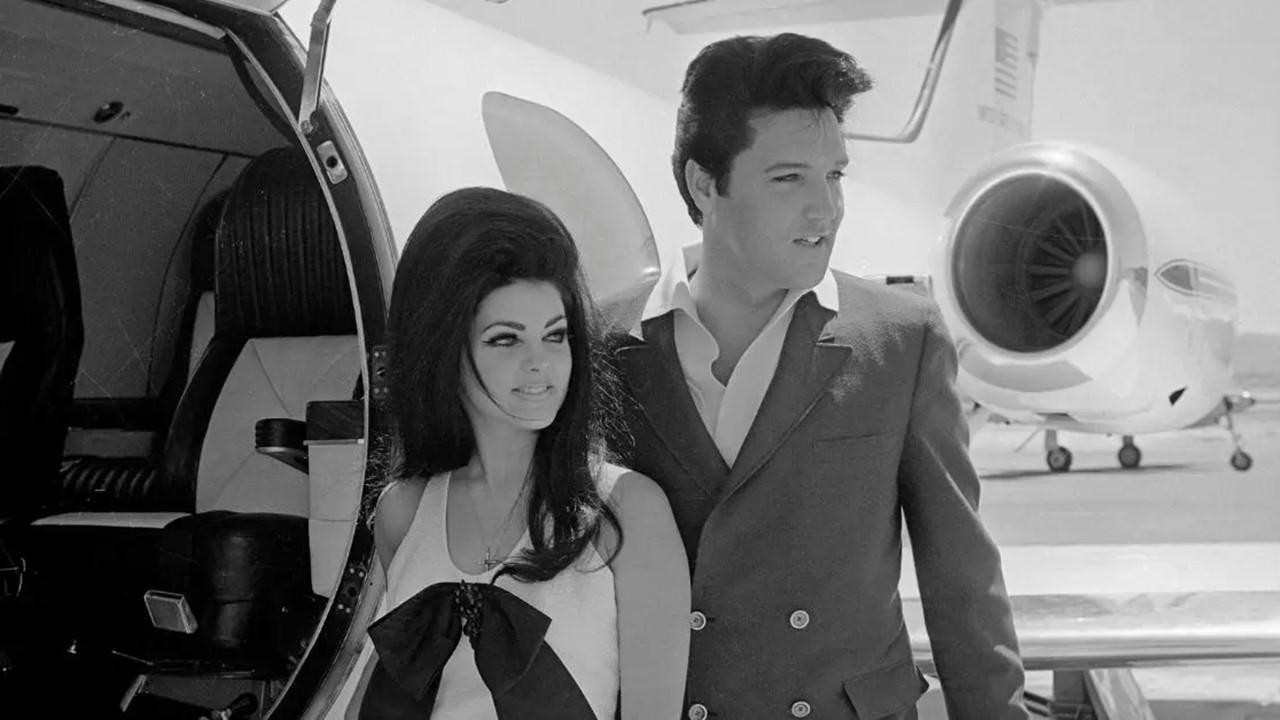 Elvis and Priscilla Presley board their private jet