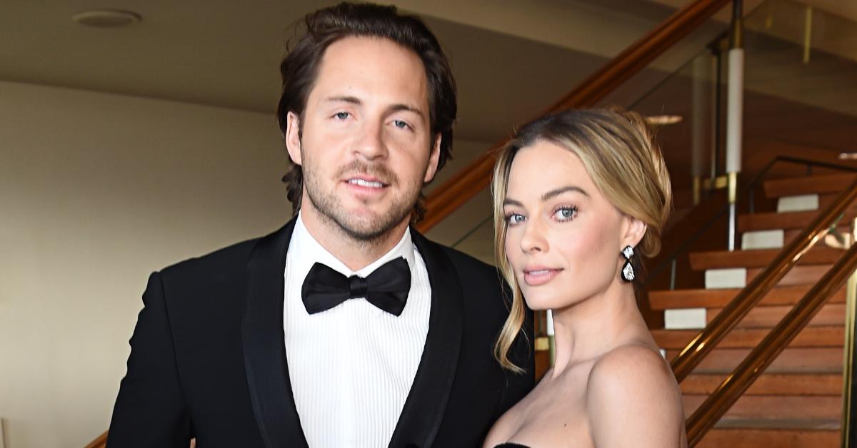 Margot Robbie and husband, Tom Ackerley, attend the 2024 EE BAFTA Film Awards at The Royal Festival Hall.