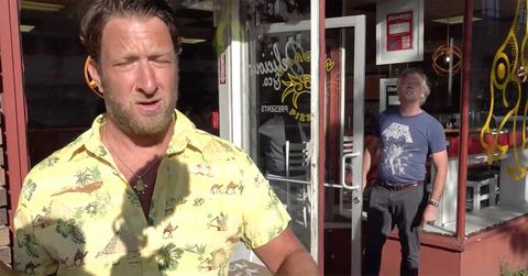 Dave Portnoy looks at the camera while he's yelled at by the owner of Dragon Pizza.