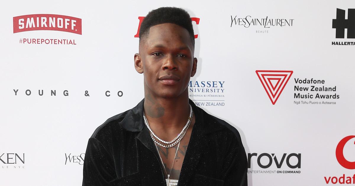 Israel Adesanya posing for a photo