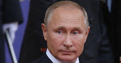 Vladimir Putin's Poop Suitcase keeps Bodyguards Humble