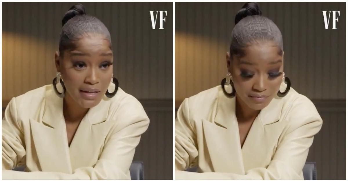 Keke Palmer looks up and then down at a picture of Dick Cheney in a 'Vanity Fair' interview.