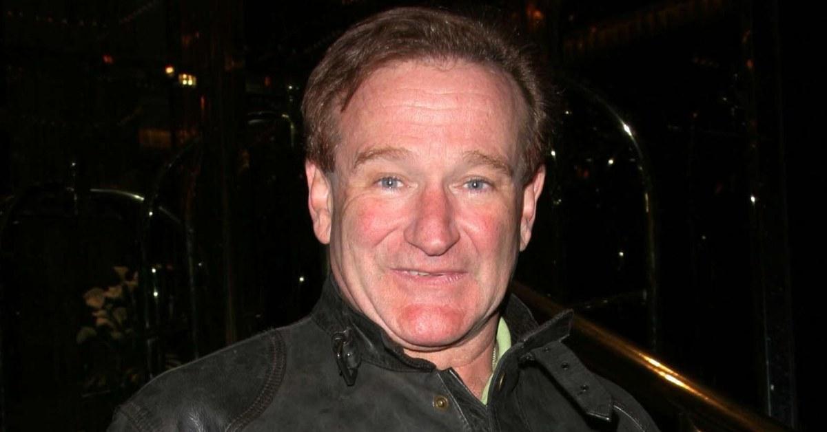 Robin Williams out and about in a black leather jacket.