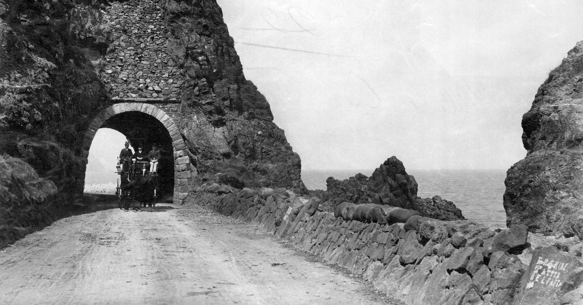 The Black Cave Tunnel and Devil's Churn in Larne, County Antrim circa 1900.