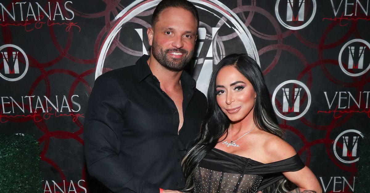 Vinny Tortorella and Angelina Pivarnick pose for photo at an event