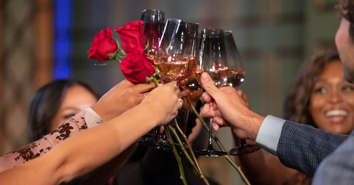 Joey Graziadei and his final six ladies clink their glasses of champagne in Season 28 of 'The Bachelor.'