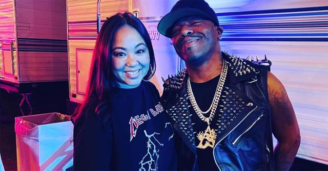 Sisqo and his wife, Elizabeth Pham outside.